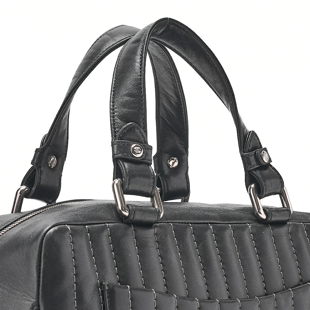 CHANEL Lambskin Mademoiselle Handbag Black Silver-Tone Hardware, Pre-Owned
