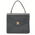 CHANEL Caviar Skin Matelasse Turn Lock V-Flap Handbag Black Gold-Tone Hardware, Pre-Owned